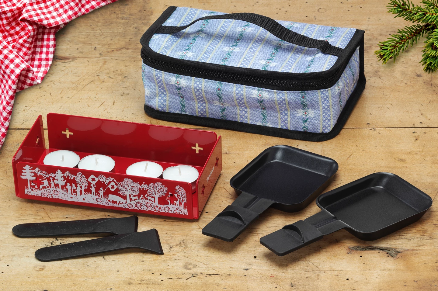 Raclette a candela con borsa Explore the Alps