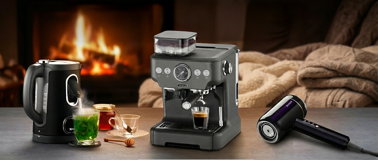 Promotional banner « Cozy Deals » featuring a kettle, espresso machine and hair dryer in a warm winter setting.
